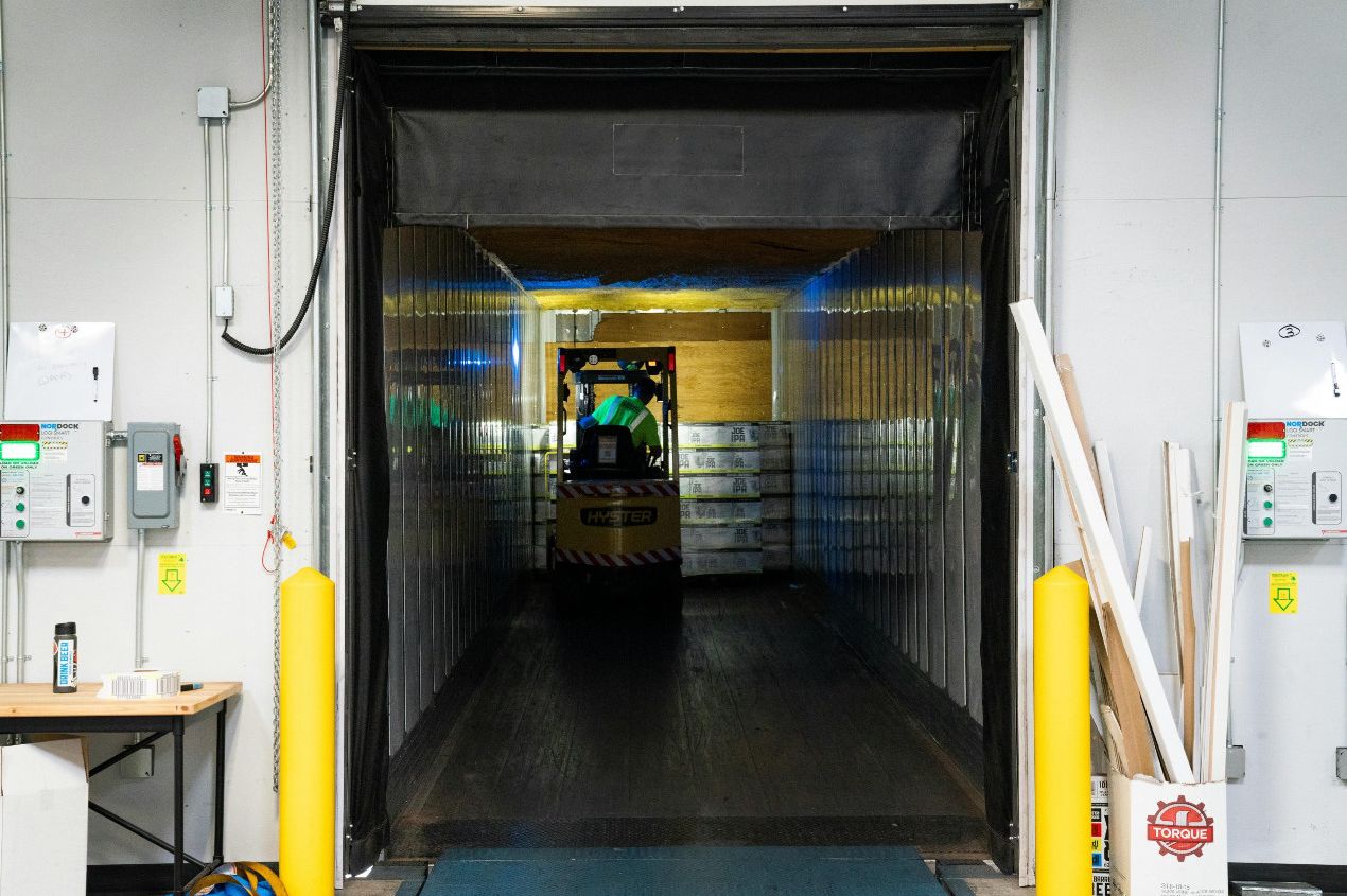 Container being efficiently unloaded and devanned at UKFM near London Gateway port
