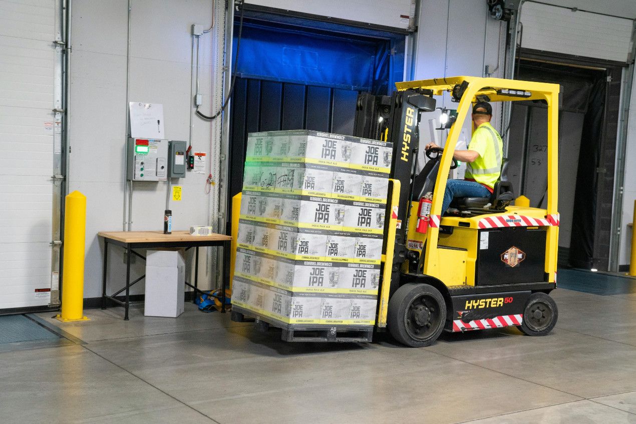 UKFM team loading and stuffing an export container at the Belvedere facility