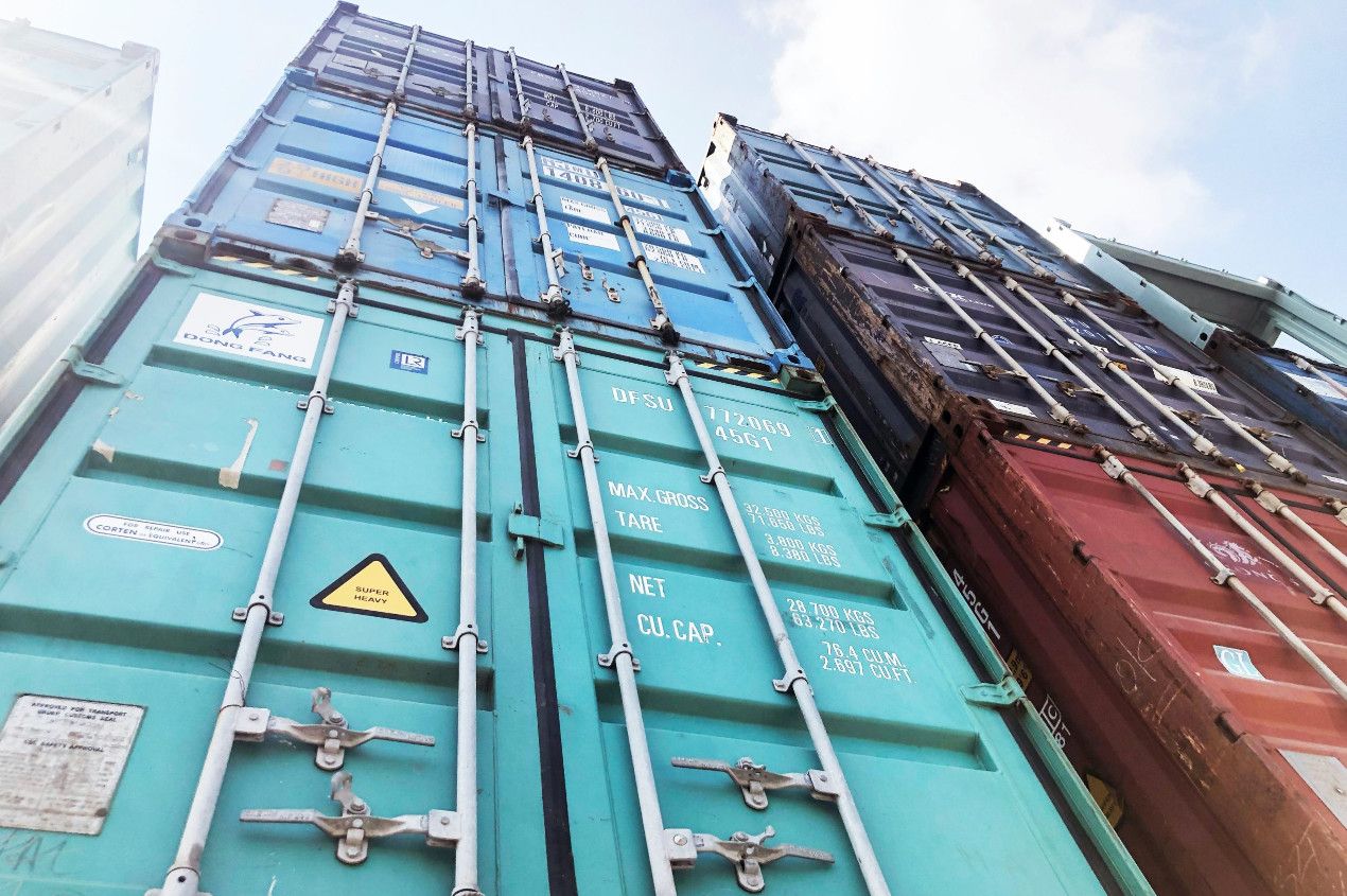 Shipping containers stored securely at UKFM's Belvedere site awaiting onward transport