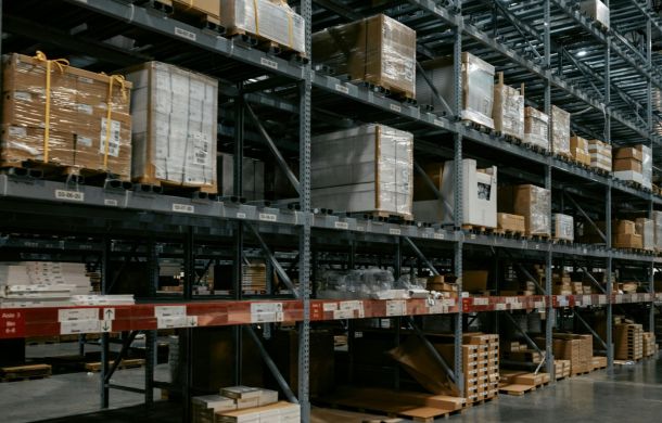 Rows of organised pallet racking inside UKFM's secure South East London storage facility