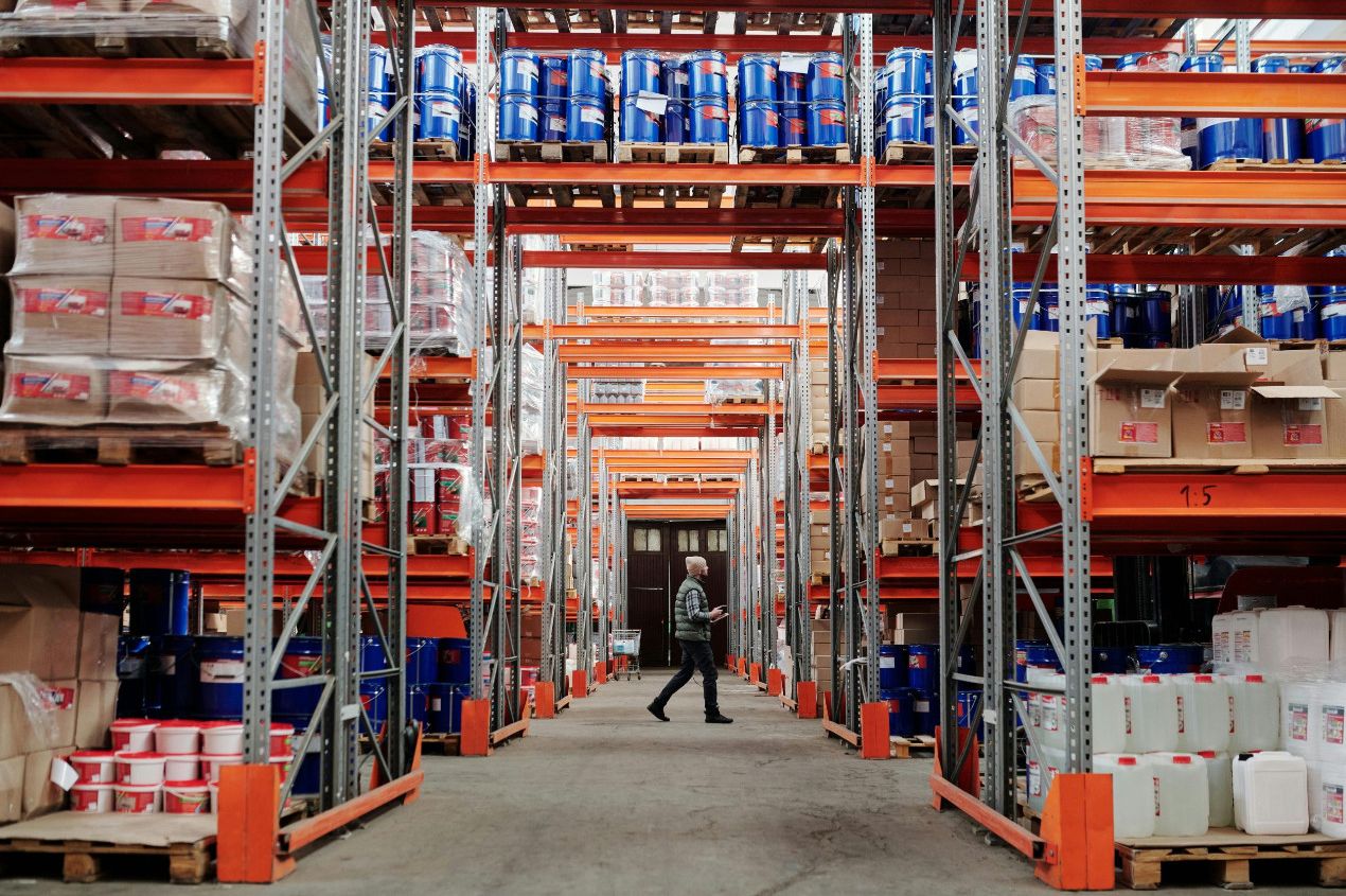 UKFM team reviewing competitive and transparent pallet storage pricing with a client